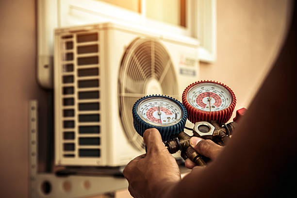 Professional Air Conditioning Service technician working in Urbana, OH